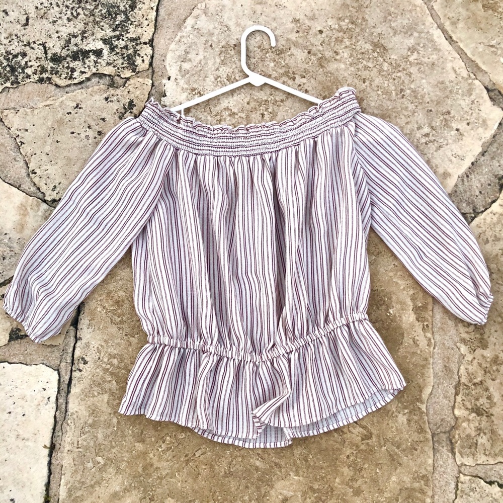 Off the shoulder mid length long sleeve.
